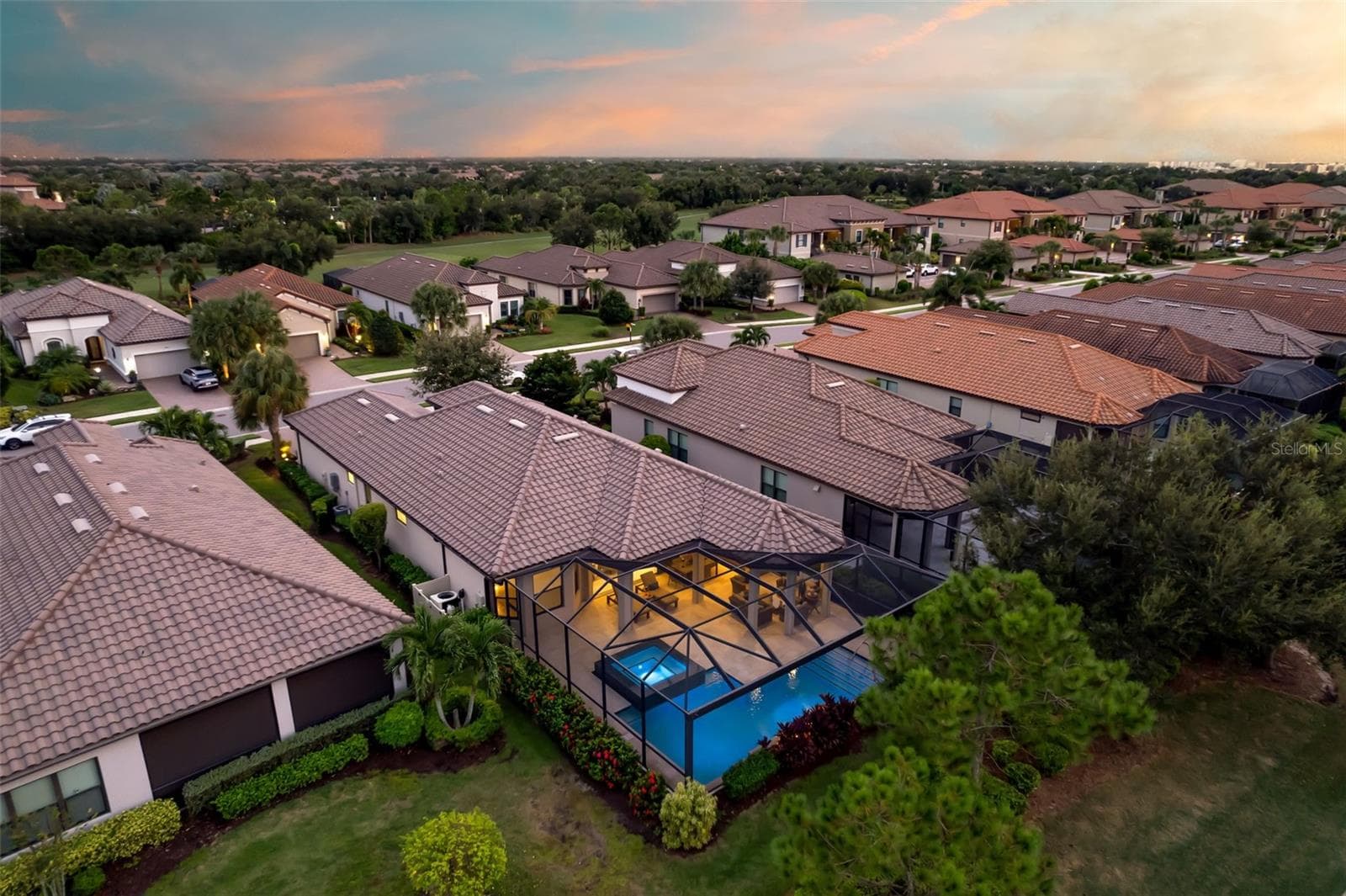 Aerial view of the pool and spa - 12807 SORRENTO WAY, BRADENTON
