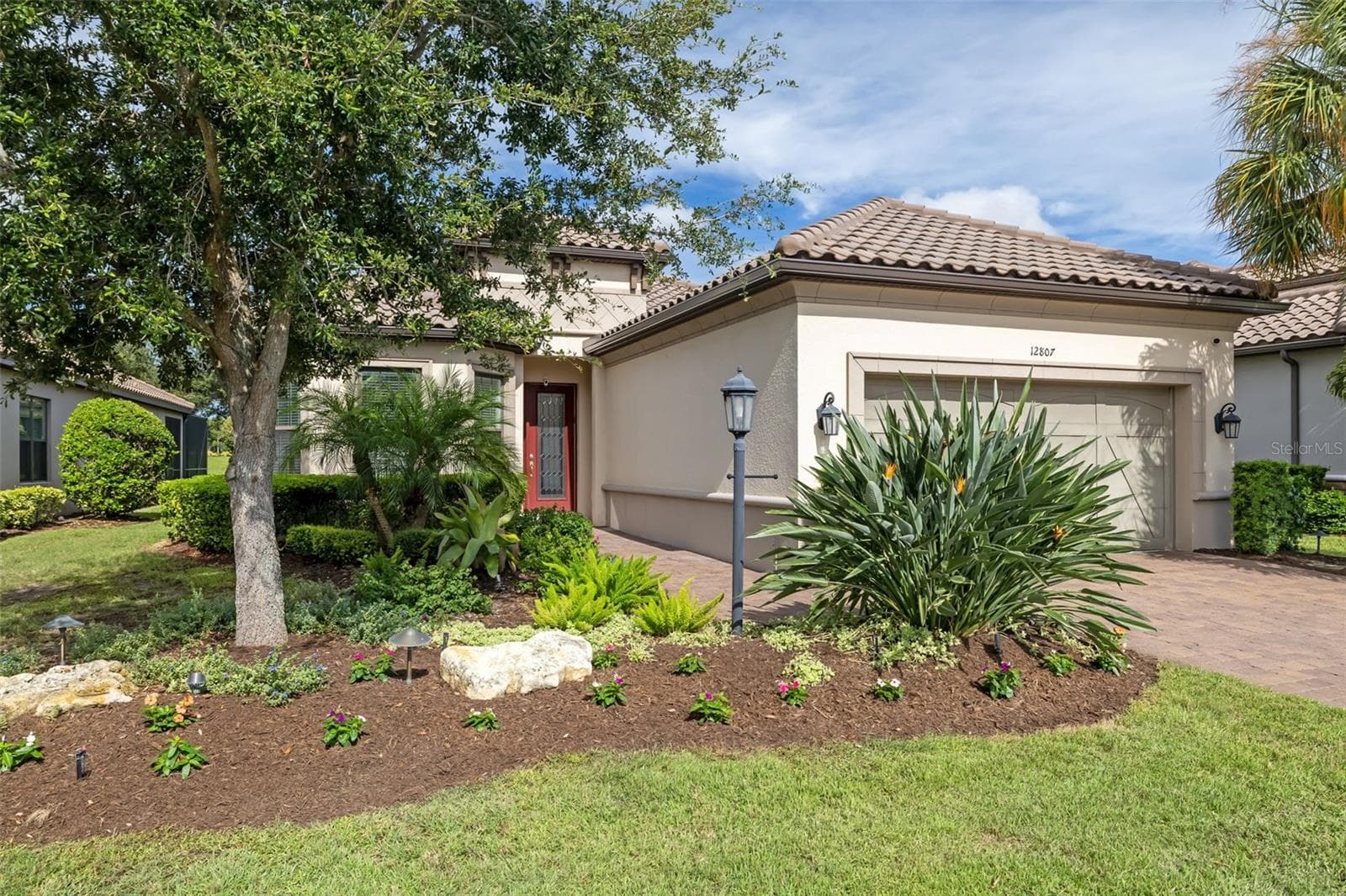 Barrel tile roofs are beautiful features in Esplanade - 12807 SORRENTO WAY, BRADENTON