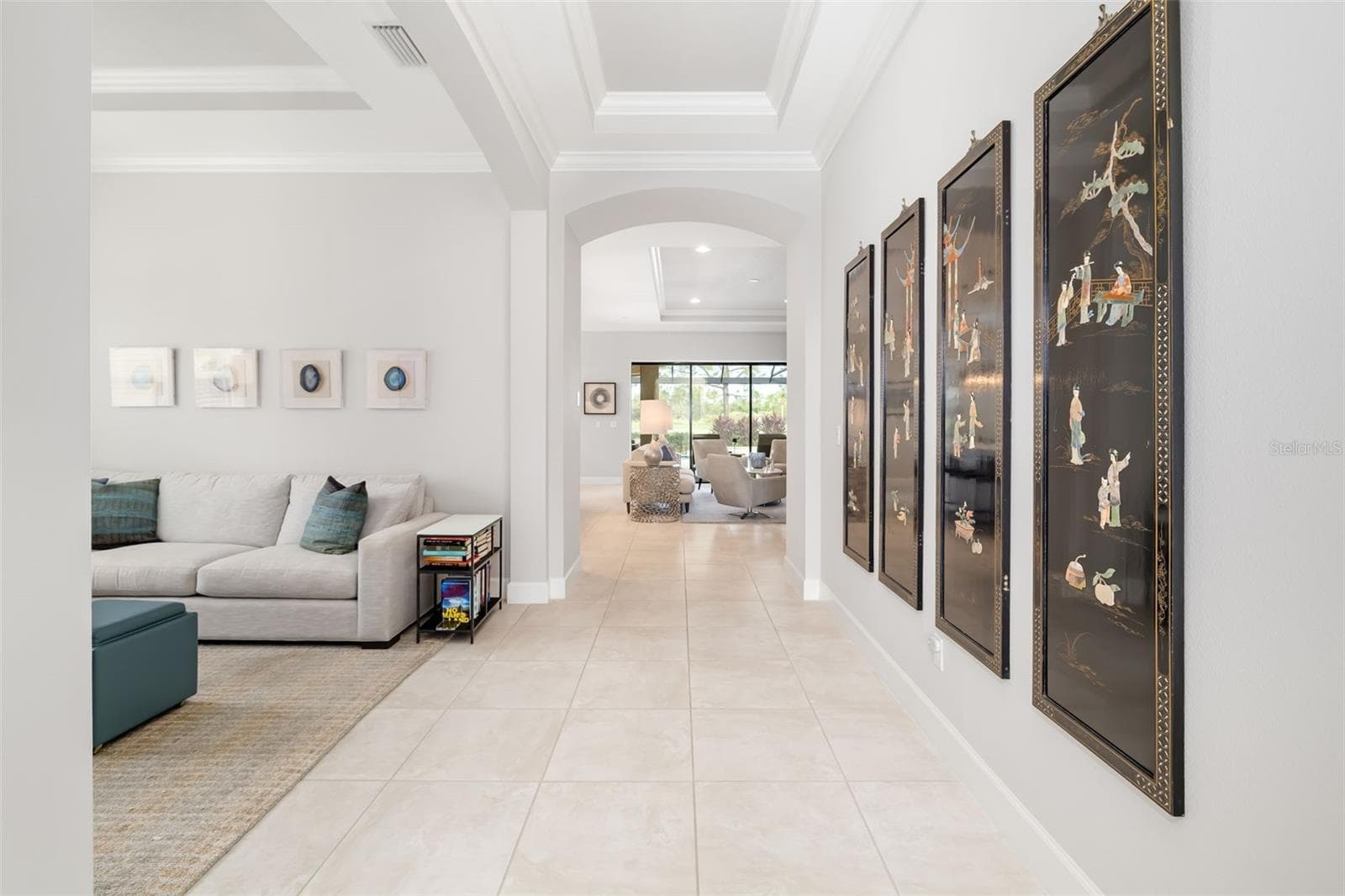 The den/flex room is open to the well defined foyer hall - 12807 SORRENTO WAY, BRADENTON