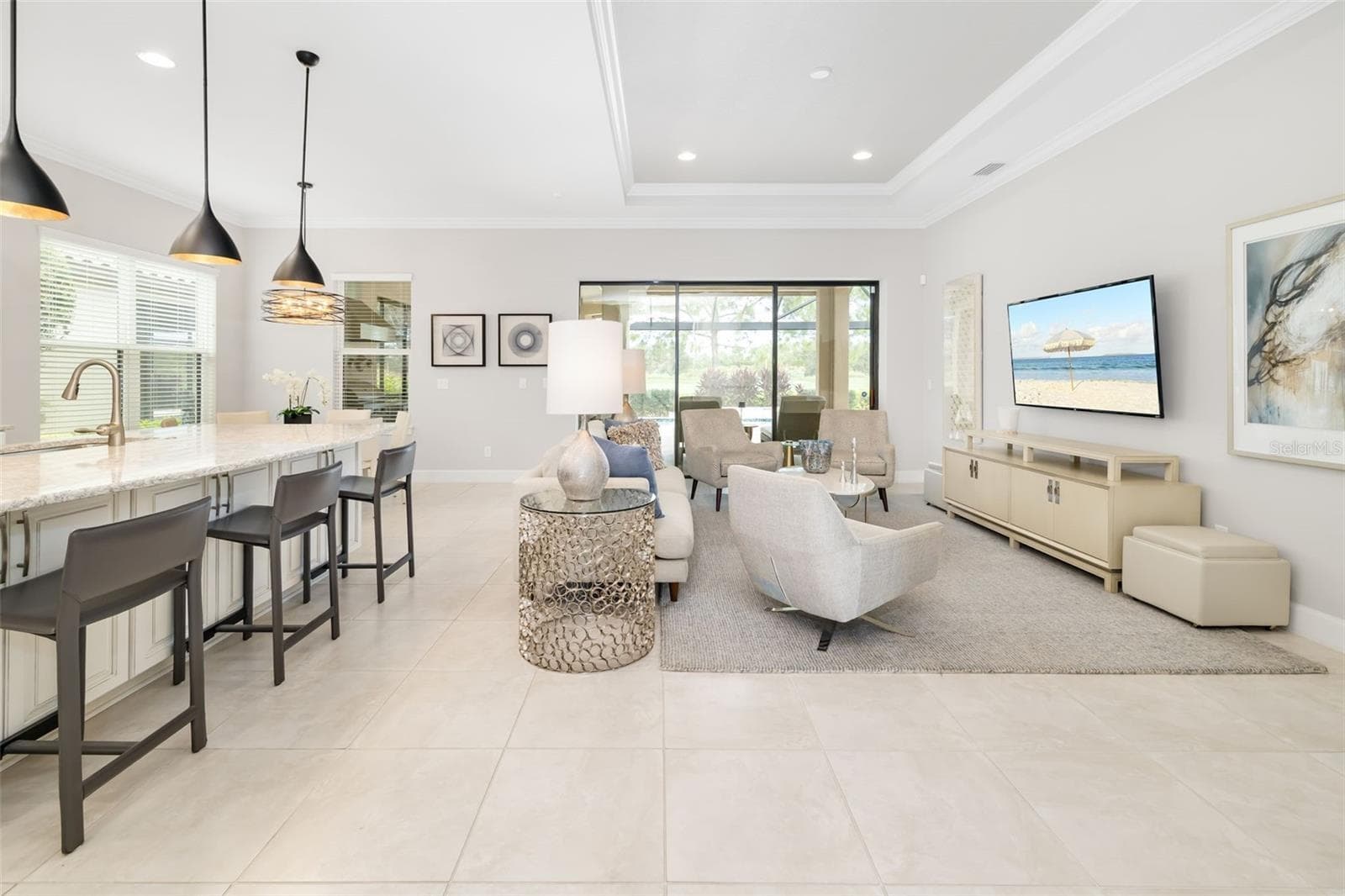 Ahead is the great room/kitchen area, the heart of the home - 12807 SORRENTO WAY, BRADENTON