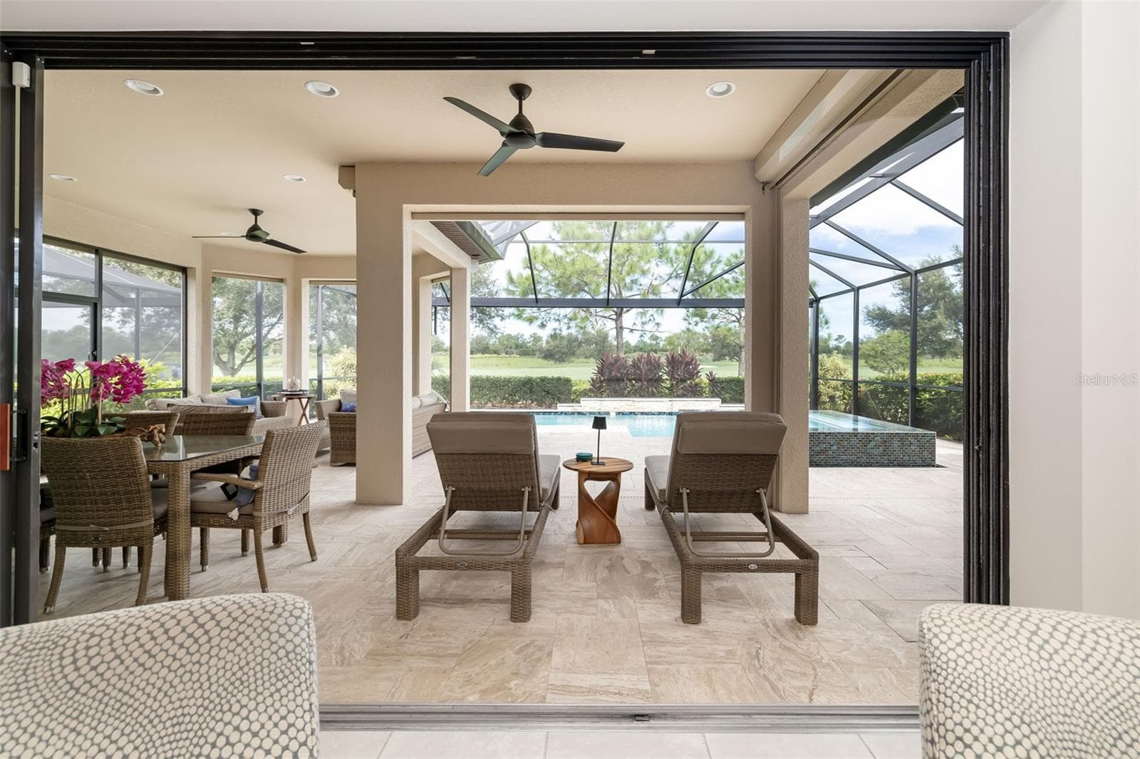 Six descending hurricane/storm shades are remote controlled and offer protection as well as peace of mind. The shades in each of the 6 framed openings can be controlled individually. - 12807 SORRENTO WAY, BRADENTON