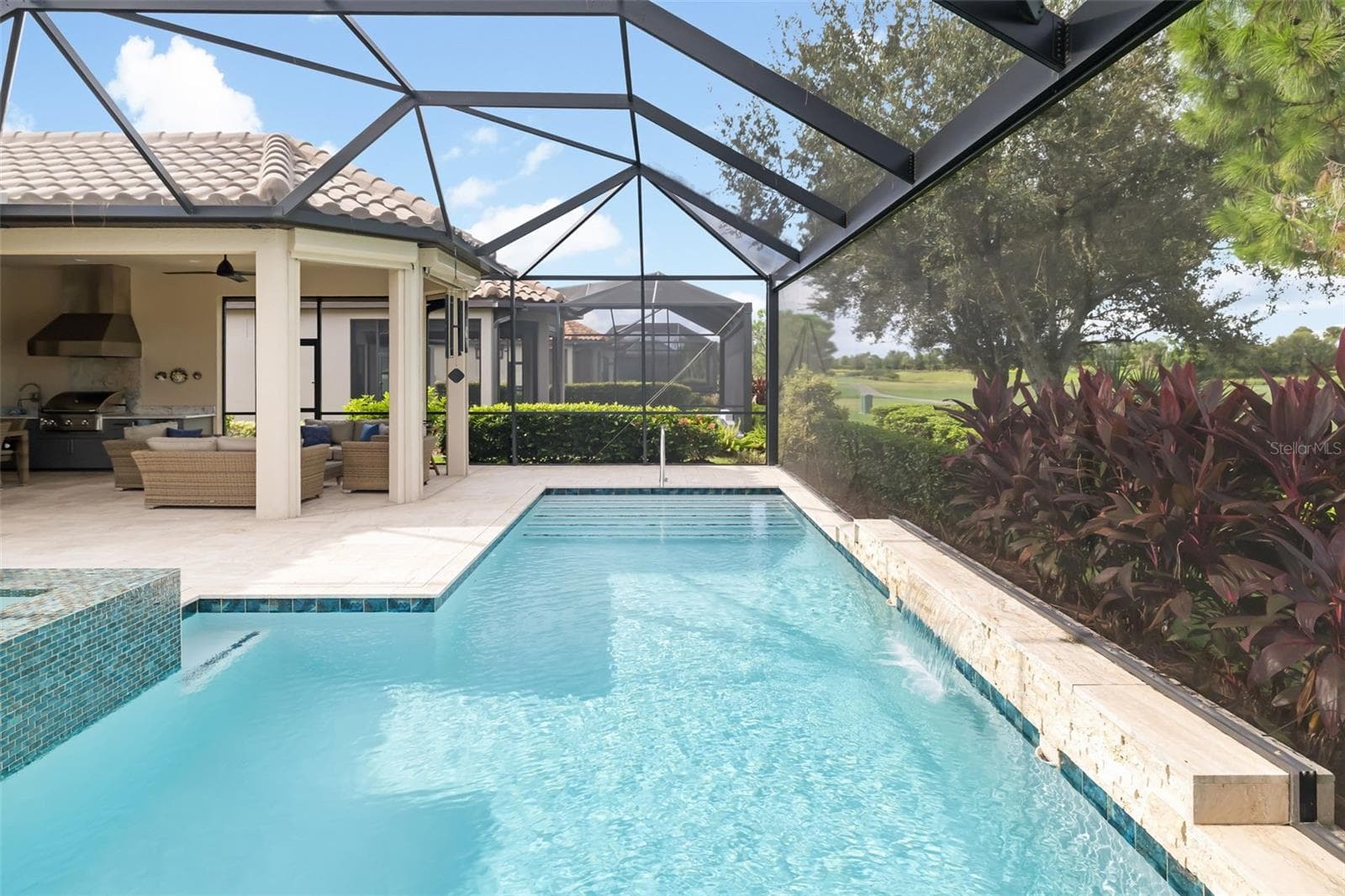 A panoramic screen brings the "outside in". - 12807 SORRENTO WAY, BRADENTON