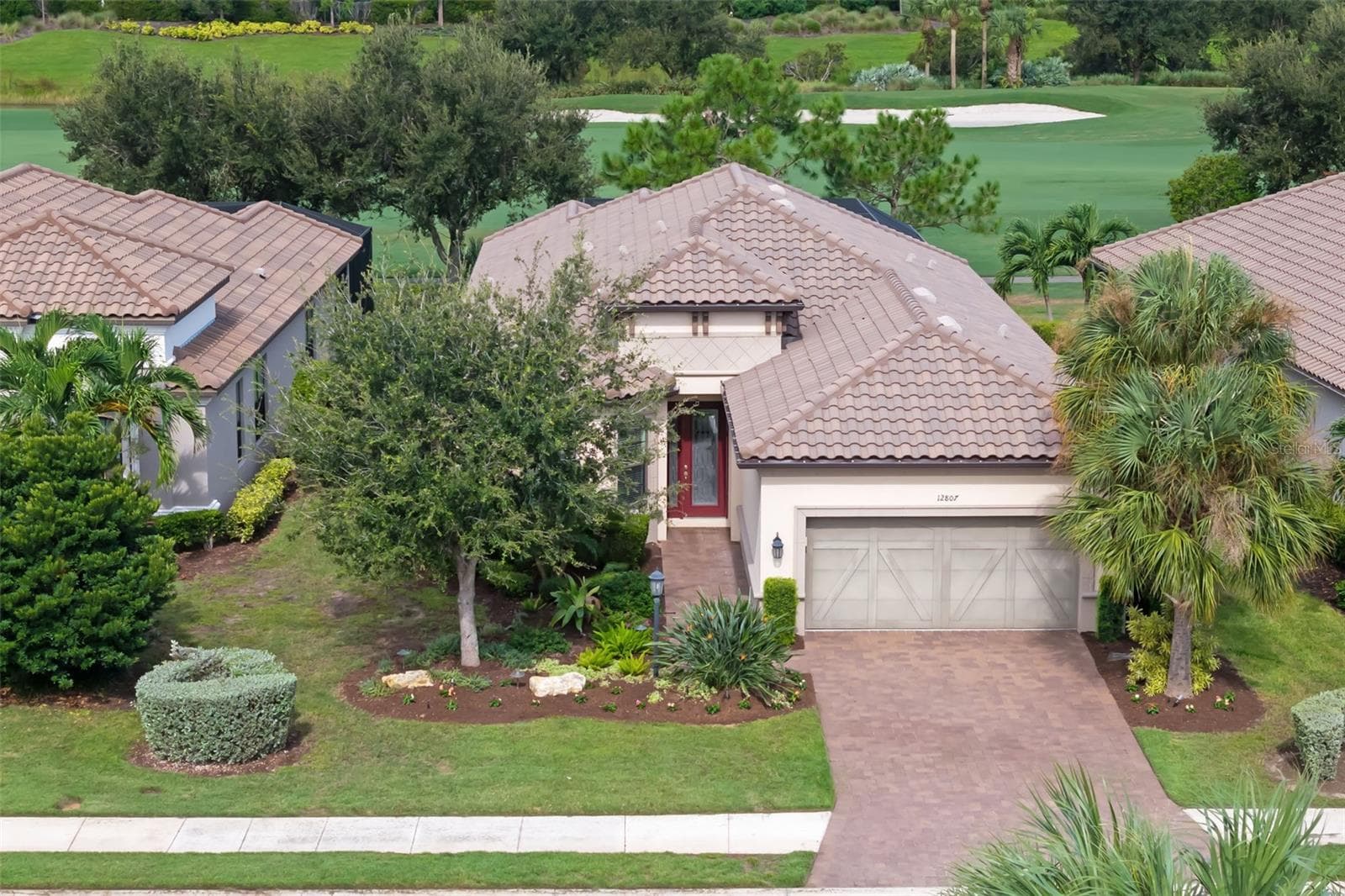 Aerial view of the front and the rear view - 12807 SORRENTO WAY, BRADENTON