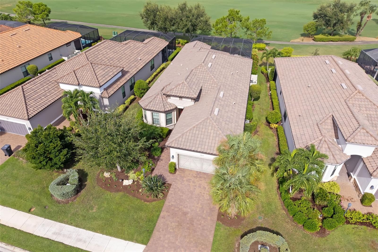Aerial of the location and neighboring homes - 12807 SORRENTO WAY, BRADENTON