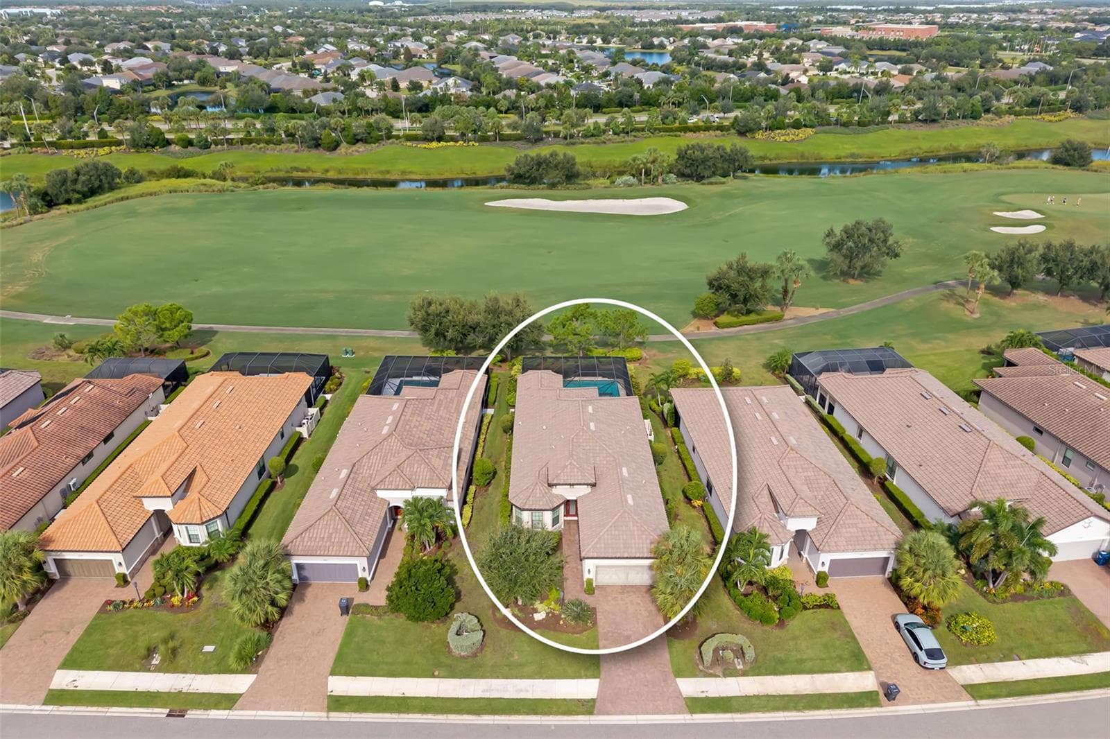 Aerial view of the home and golf fairway - 12807 SORRENTO WAY, BRADENTON