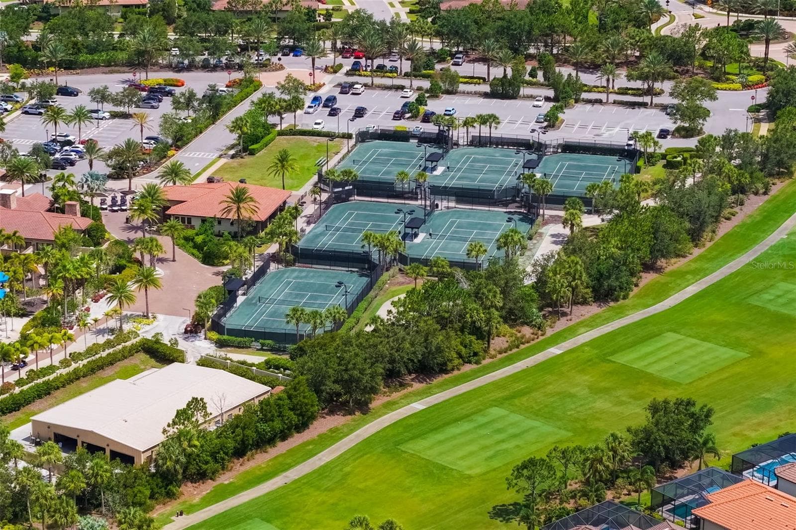 Near the Wellness Center is the Tennis Center with 6 har-tru courts and a great pro! - 12807 SORRENTO WAY, BRADENTON