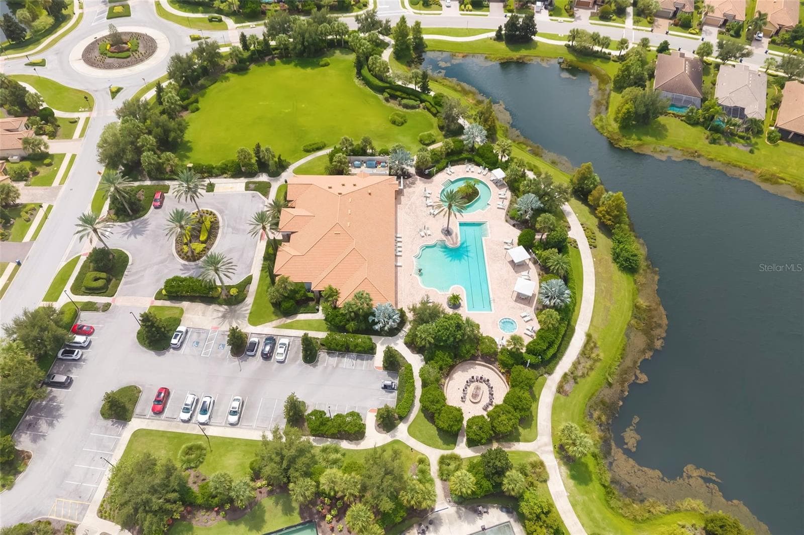 The Amenity Center pool with lap lanes and the resistance pool above it for walking. Exercise classes are here in this pool! - 12807 SORRENTO WAY, BRADENTON