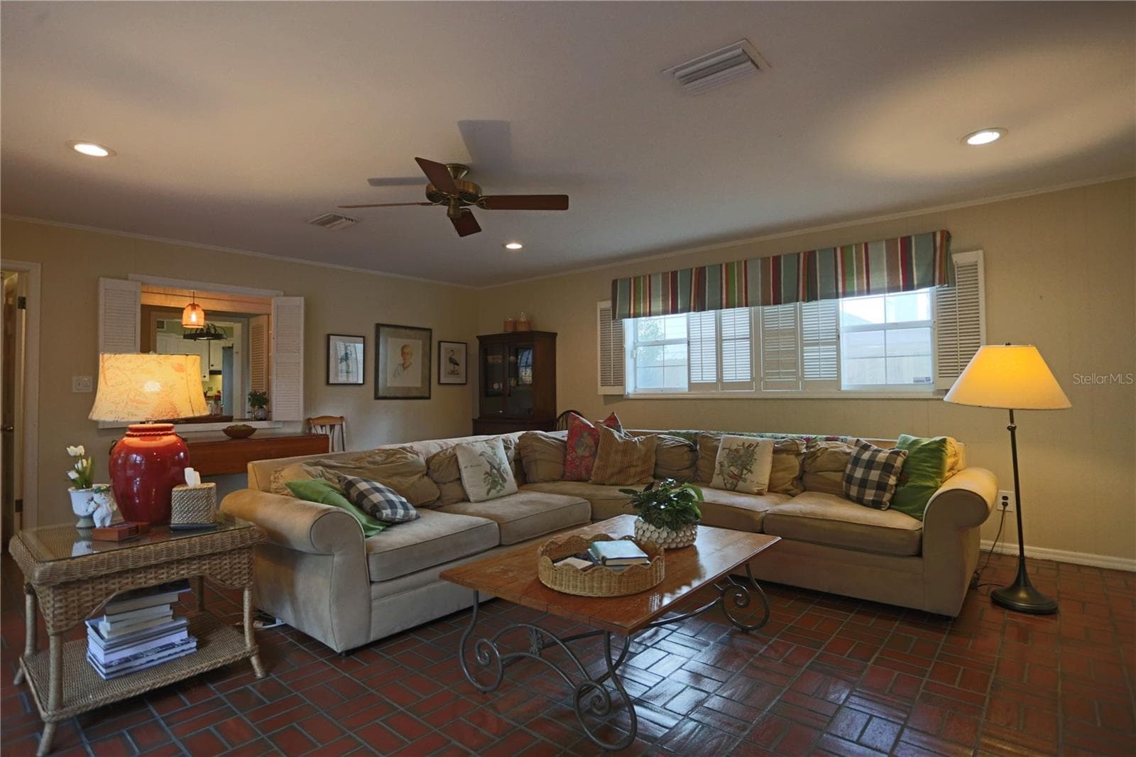 Spacious Family Room with brick flooring. - 4414 W WATROUS AVE, TAMPA
