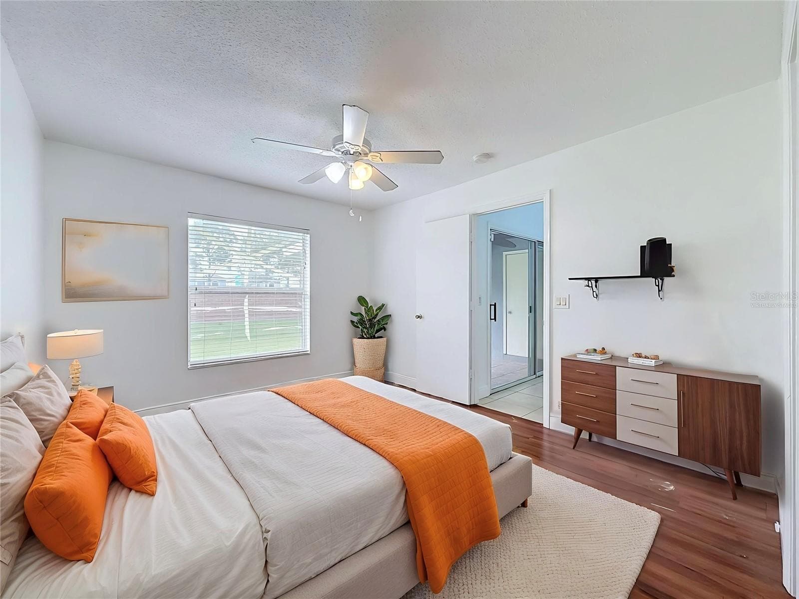 virtually staged primary suite - 13518 SUMMERTON DR, ORLANDO