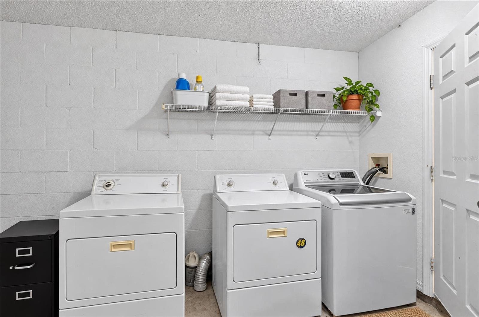 Laundry in Garage - 13184 MONTEGO ST, SPRING HILL