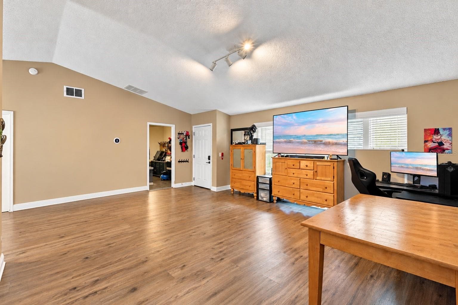 Front door and garage laundry access. - 2992 INCA CT, DELTONA