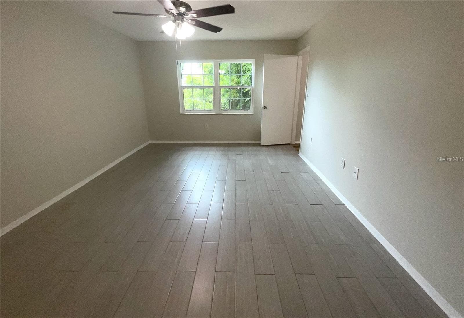 Bedroom 2 door to bonus room - 1020 85TH AVE N #222, ST PETERSBURG