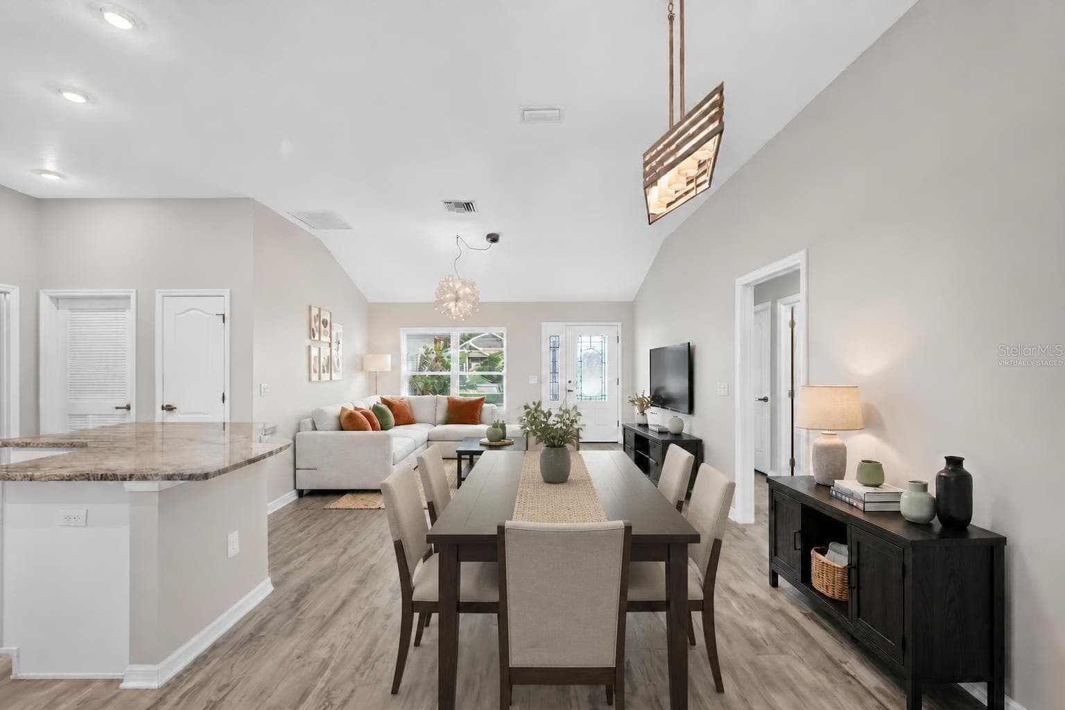 Living, Dining, and Kitchen-Virtually Staged - 3254 ZIPPERER WAY, THE VILLAGES