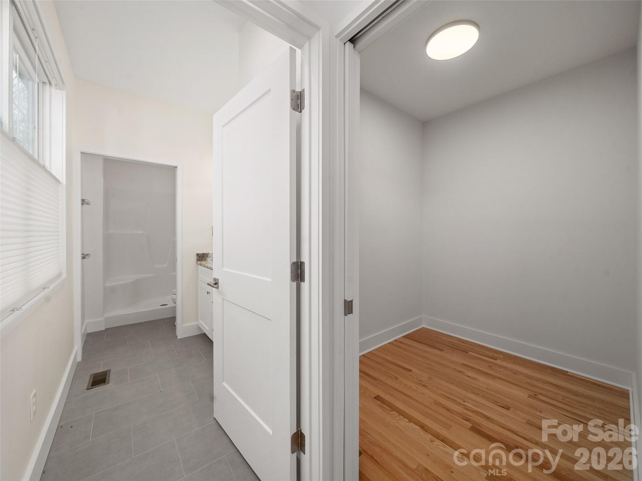 Walk-in Closet in the Primary/Front Bedroom - 43 Skyvue Court, Saluda