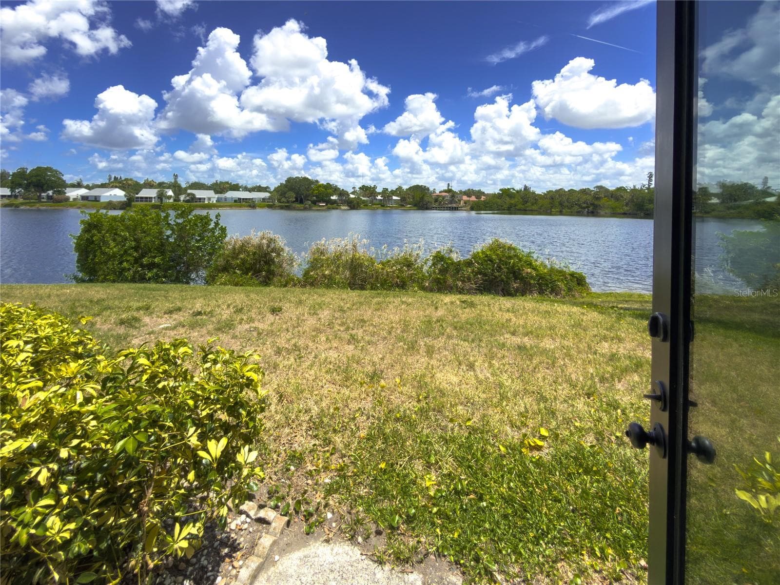 beautiful lake view from lanai! - 220 LAKEWOOD DR #220, BRADENTON