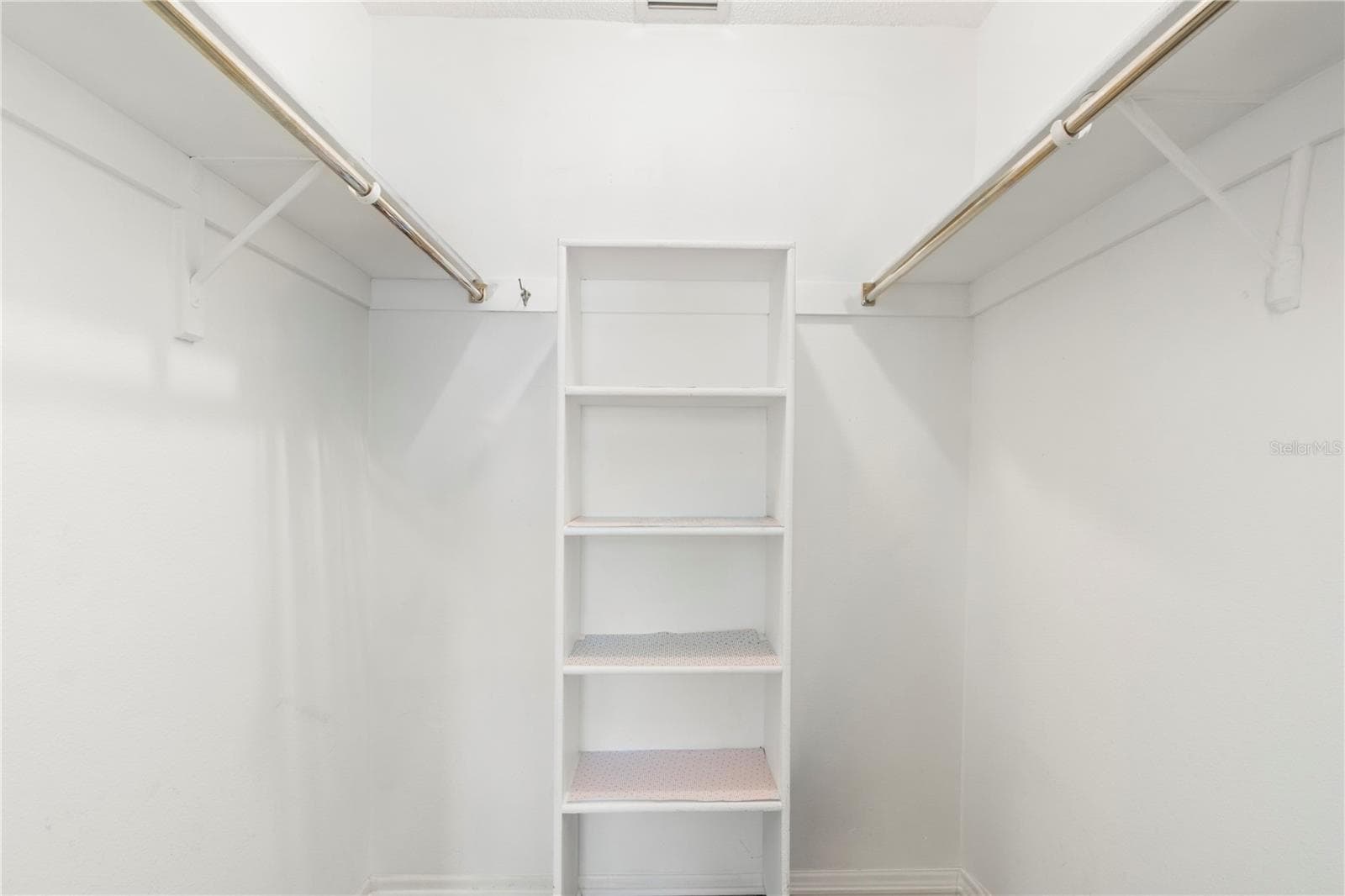 Primary bedroom closet. - 220 LAKEWOOD DR #220, BRADENTON