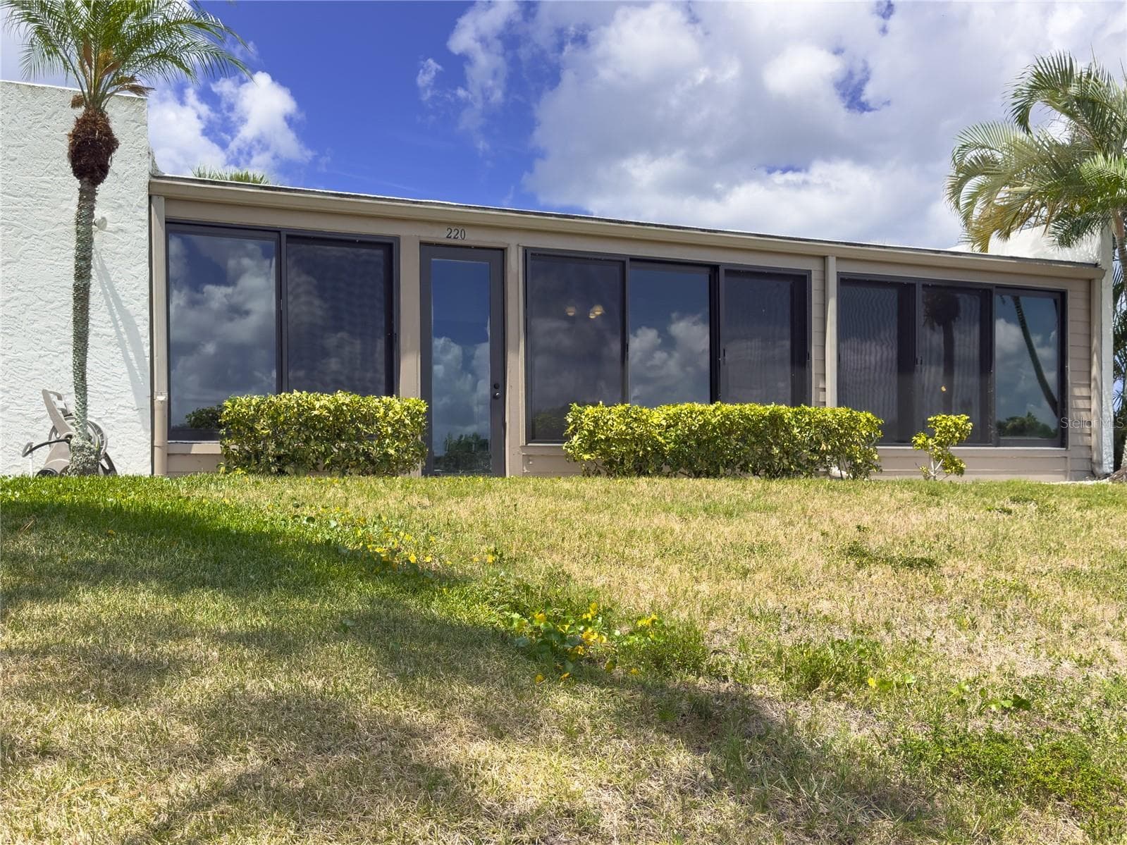 Rear door. - 220 LAKEWOOD DR #220, BRADENTON