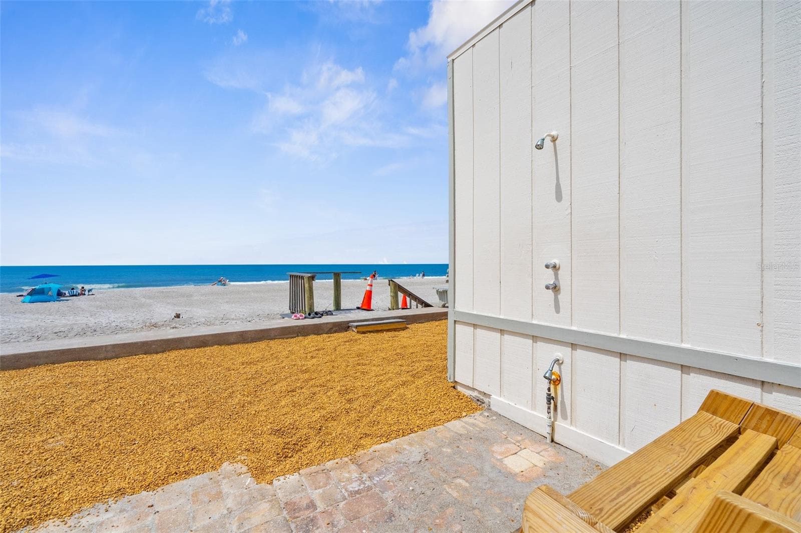 Private Beach Access, No need to worry about getting sand in your condo when you can take a hot shower before going back home. - 600 SUTTON PL #101B, LONGBOAT KEY
