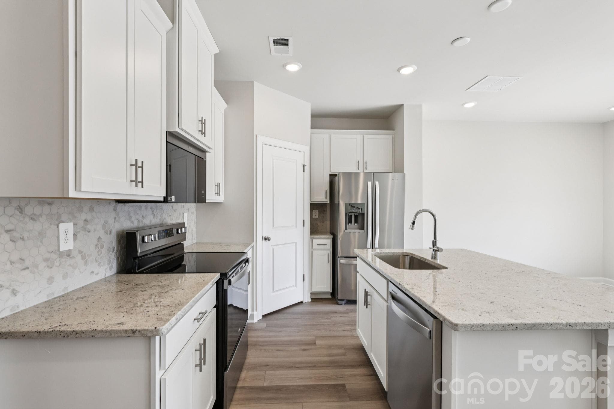 Photo is not of the actual home but is an inspirational photo of builder’s model home and may depict options, furnishings, and/or decorator features that are not included. - 8009 Hidden Springs Trail, Charlotte