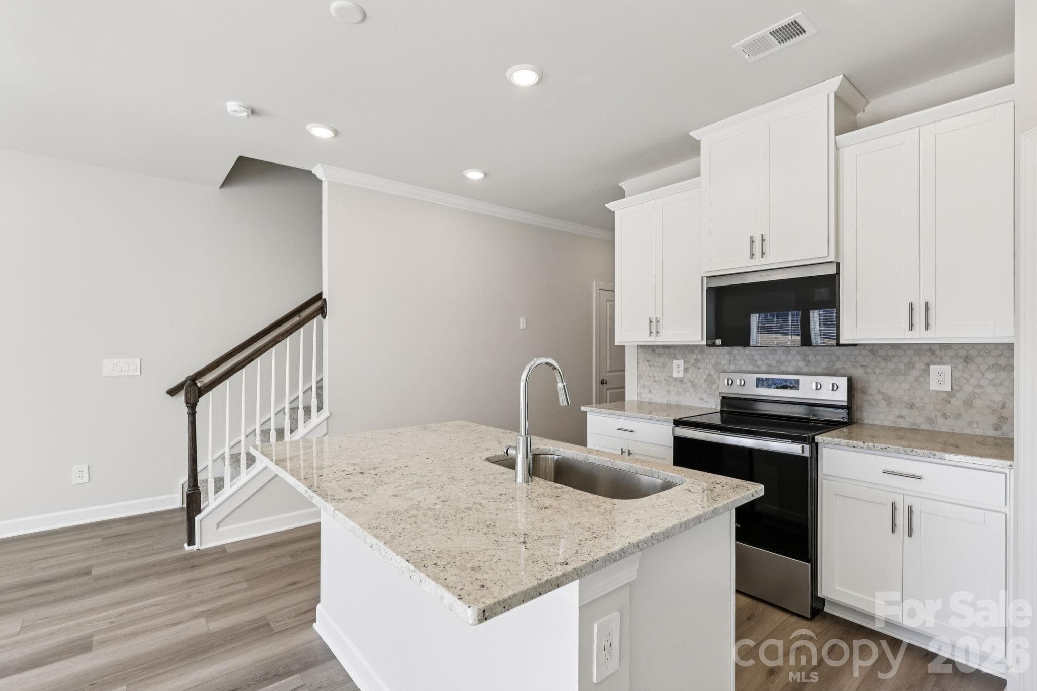 Photo is not of the actual home but is an inspirational photo of builder’s model home and may depict options, furnishings, and/or decorator features that are not included. - 8009 Hidden Springs Trail, Charlotte