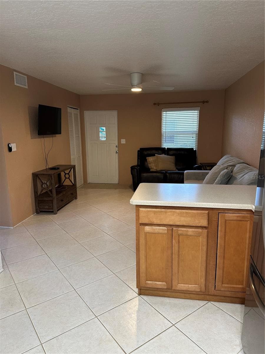 Kitchen to Living Room - 236 WOODLAND AVE #1, COCOA BEACH