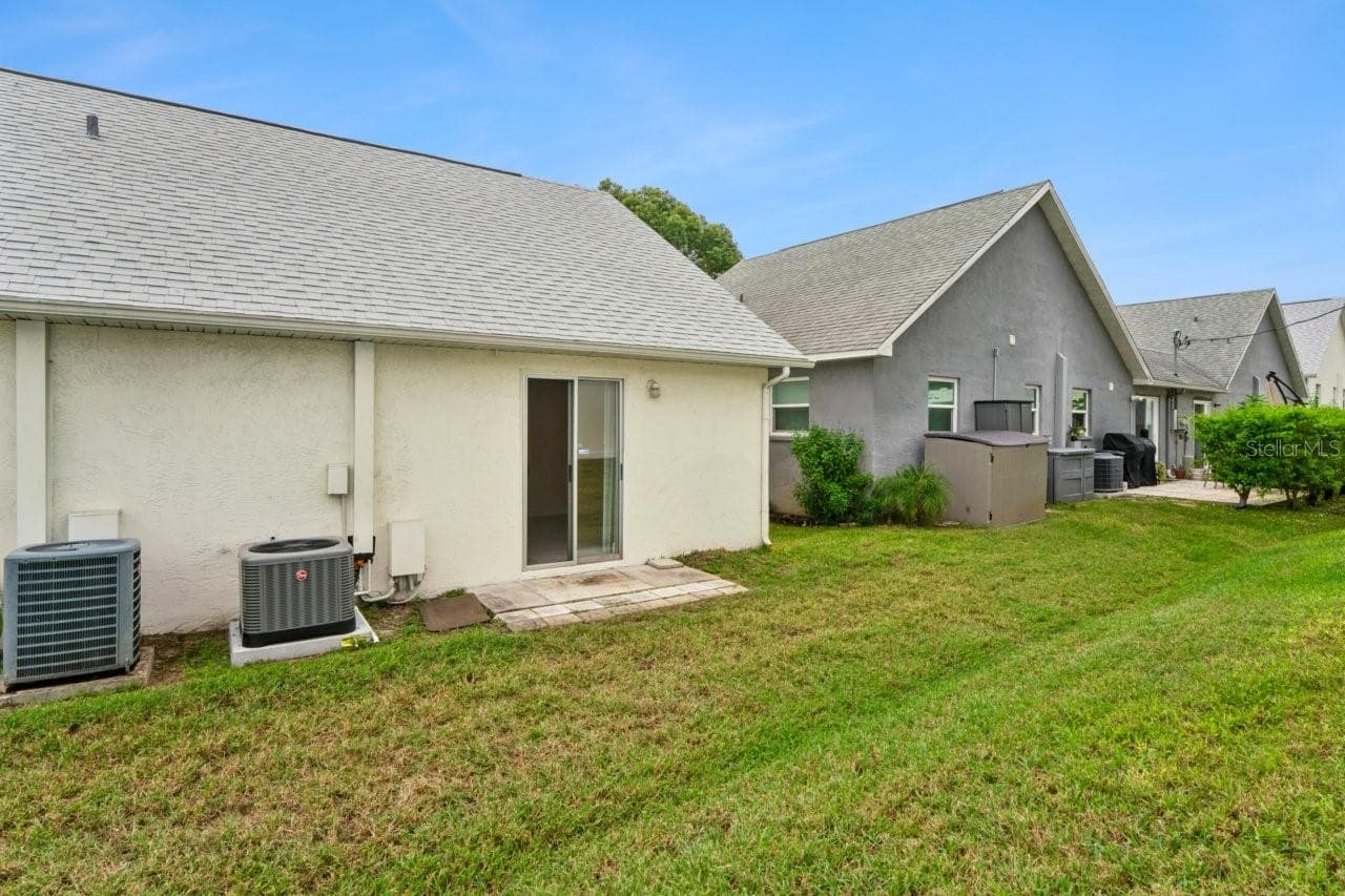 Back yard view. - 6709 DEVONSHIRE LN #10A, NEW PORT RICHEY