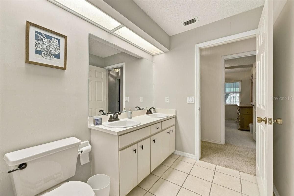 Guest bath - 4437 FLINTLOCK LOOP, LAKELAND