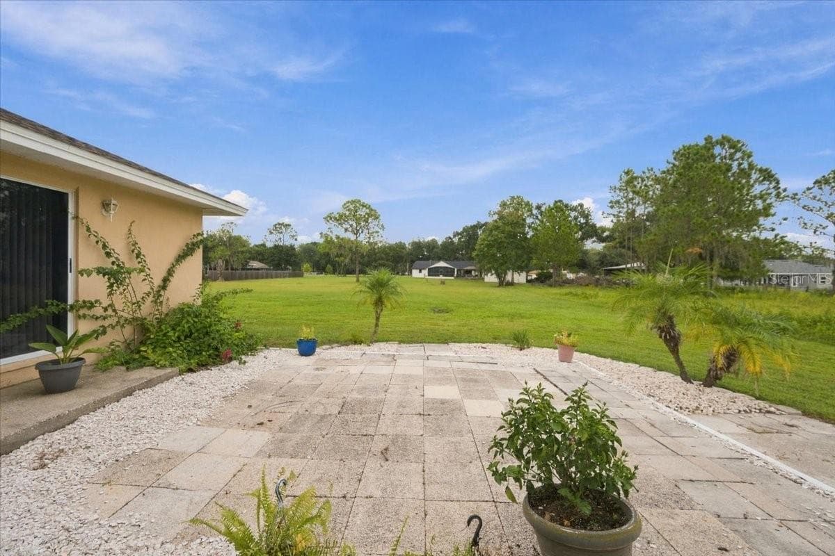 Rear patio - 4437 FLINTLOCK LOOP, LAKELAND