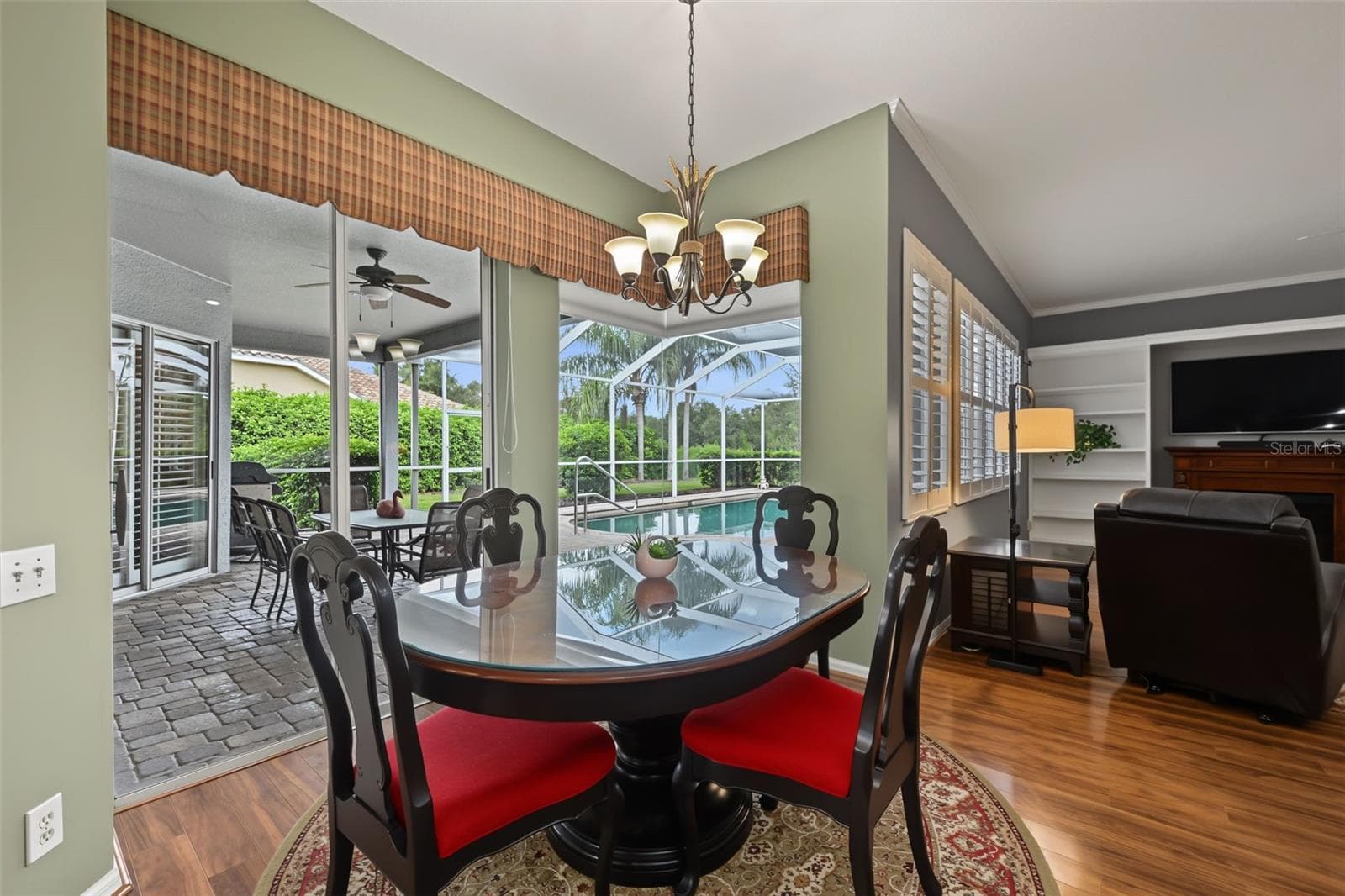 Breakfast nook with access to pool/lanai area - 1028 HAGEN DR, NEW PORT RICHEY