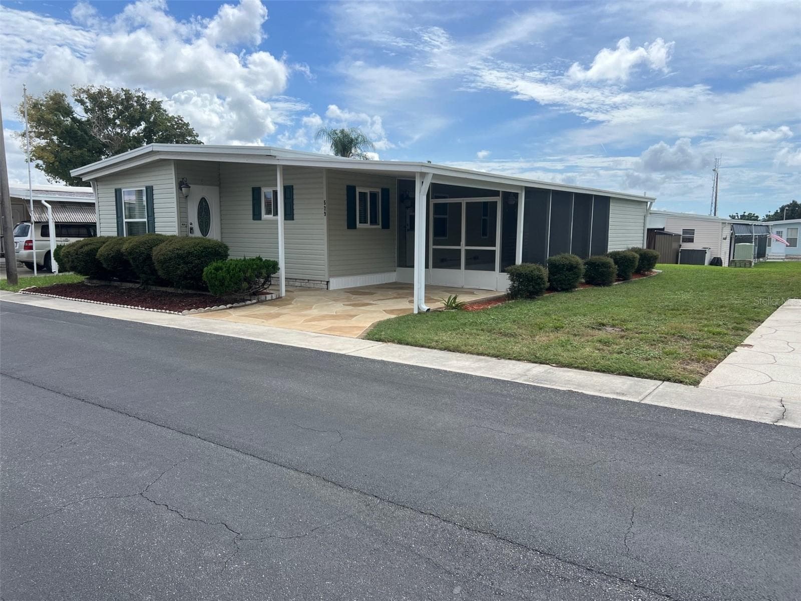 Manufactured Home at 529 NEEDLE PALM ST, LARGO, photo 3 of 32