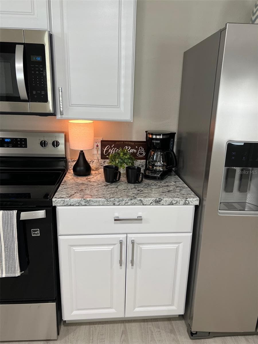 Manufactured Home at 529 NEEDLE PALM ST, LARGO, photo 12 of 32