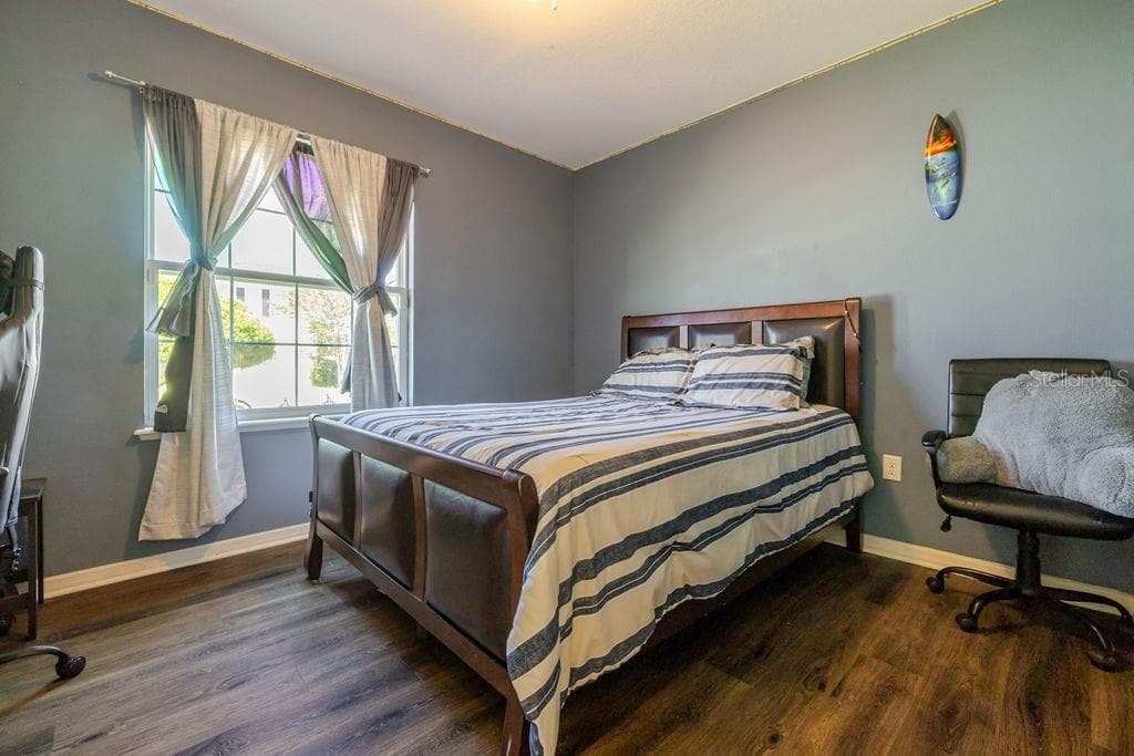 Bedroom 1 with vinyl plank floors - 252 SHERRI LEE LN, DELAND