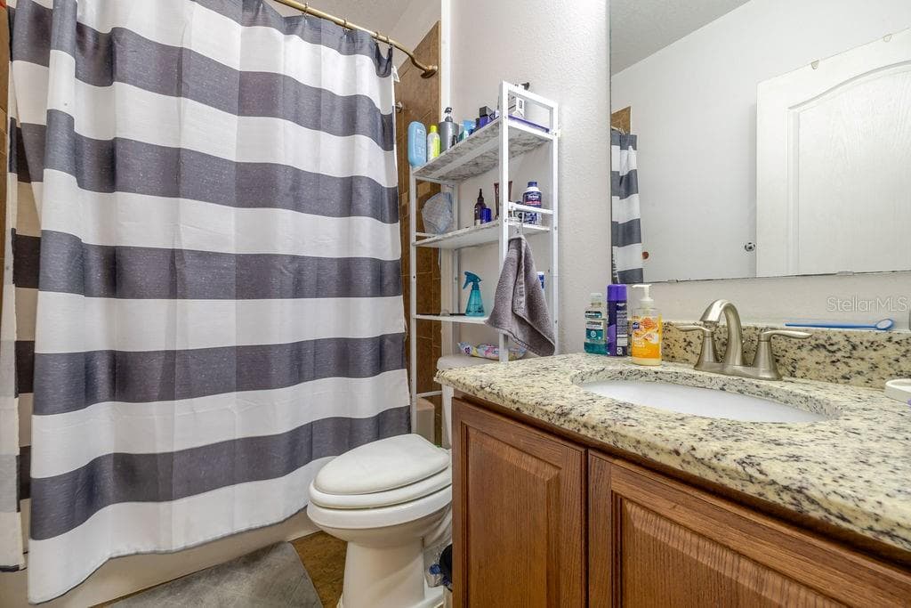 Get bathroom with granite countertop - 252 SHERRI LEE LN, DELAND