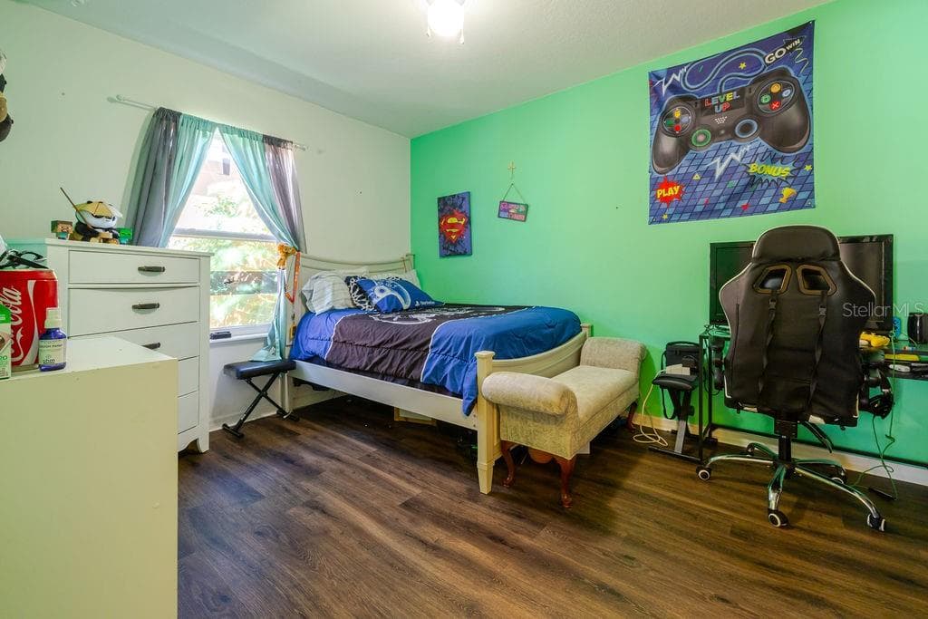 Bedroom 2 with vinyl plank floors - 252 SHERRI LEE LN, DELAND