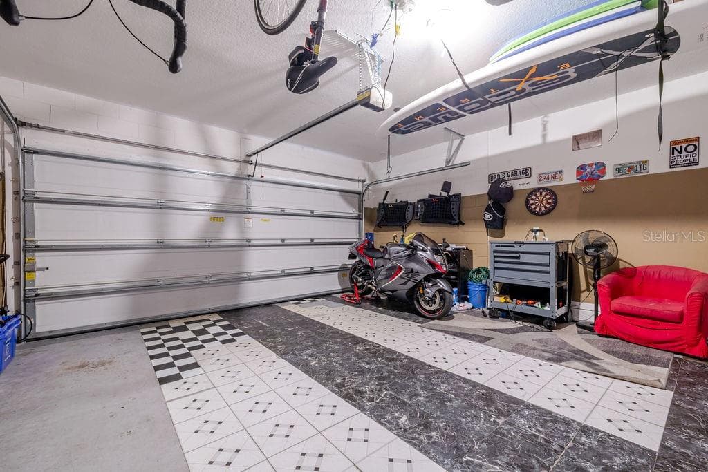 2-car garage with room for parking or storage - 252 SHERRI LEE LN, DELAND