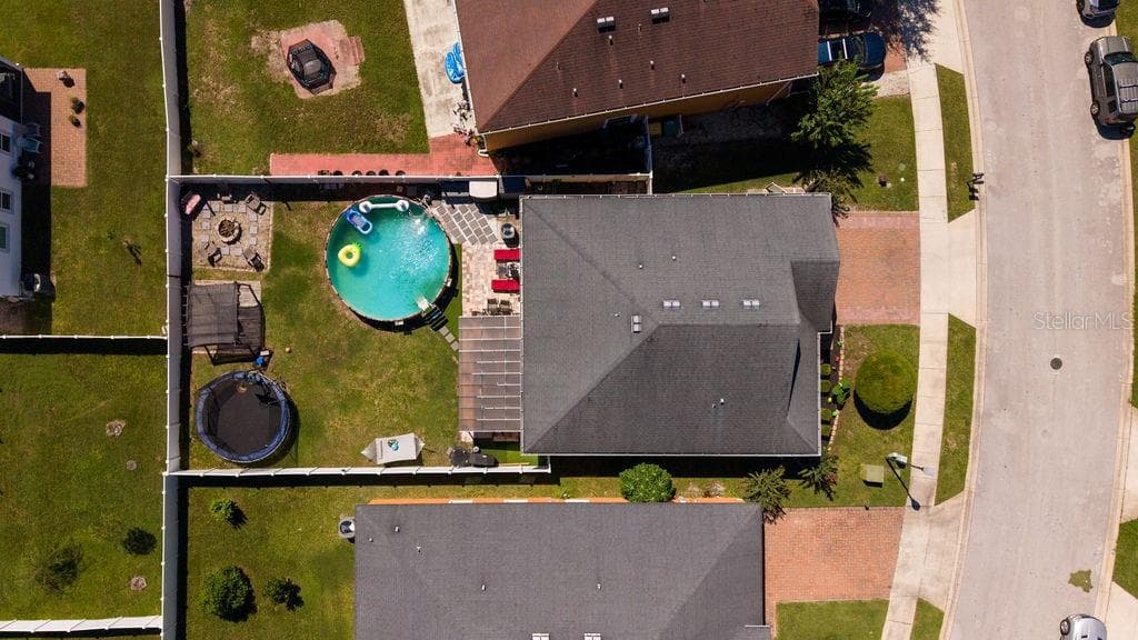 Aerial view of home with above ground pool. - 252 SHERRI LEE LN, DELAND