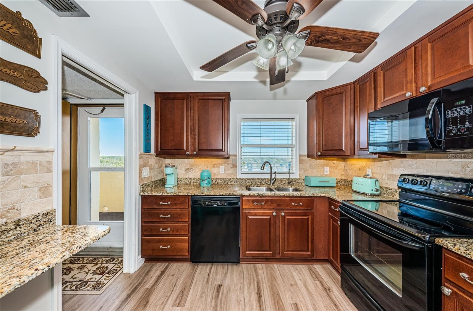 Updated kitchen 2016 with granite counter tops, coffee counter and a lot of storage - 4575 COVE CIR #1003, ST PETERSBURG