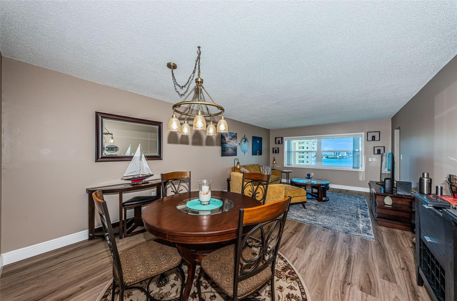 Dining area with water views - 4575 COVE CIR #1003, ST PETERSBURG