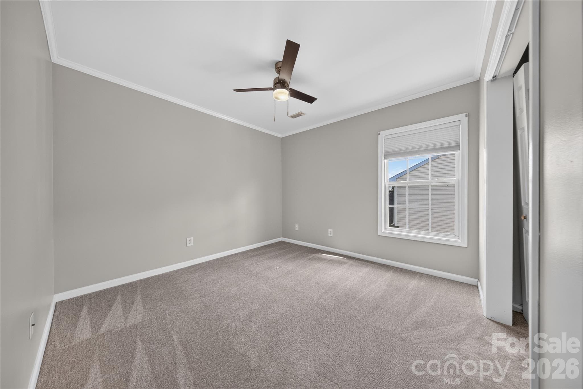 Secondary bedroom upstairs at the front of the house - 5725 Lindley Crescent Drive, Indian Trail