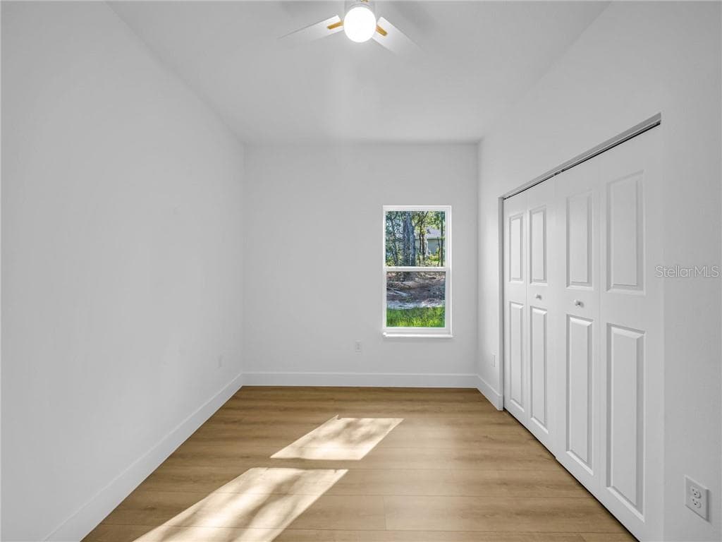 Bedroom 2 with Natural Light and Closet Space - 6664 N Bedstrow BLVD, CITRUSSPRINGS FL 34434, Citrus Springs