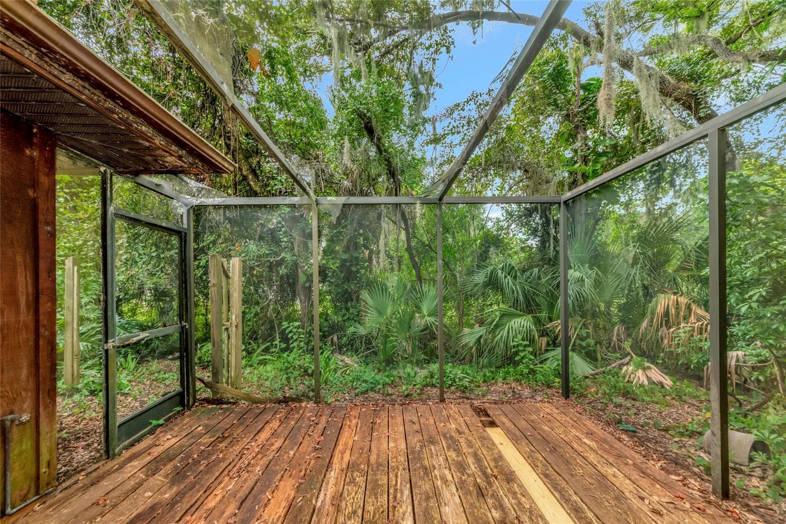 10 x 13 Foot Wood Deck off the Florida Room needs Repair. - 4781 STONE RIDGE TRL, SARASOTA