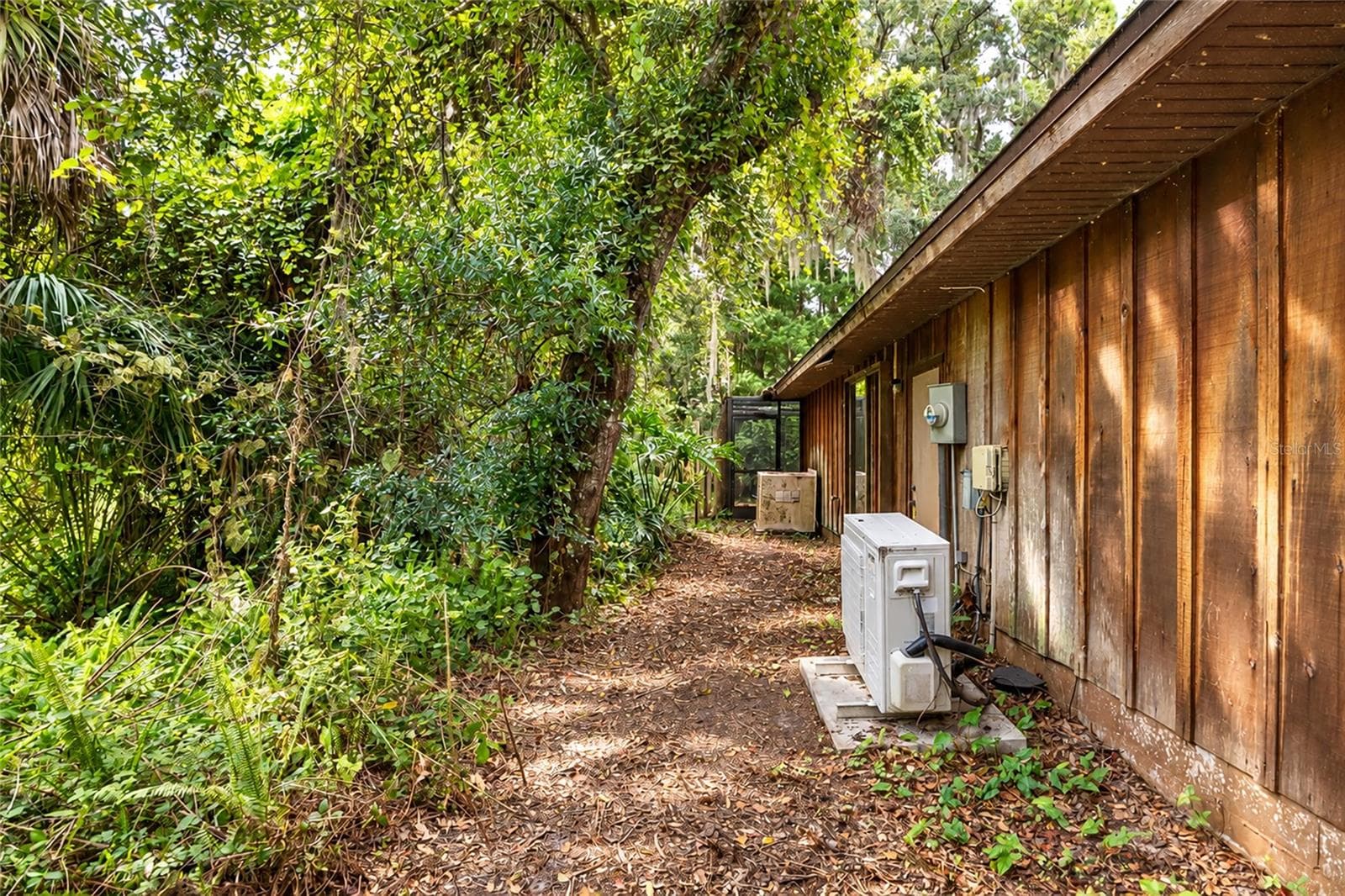 Left Side of the House. Two Zone Air Conditioning. - 4781 STONE RIDGE TRL, SARASOTA