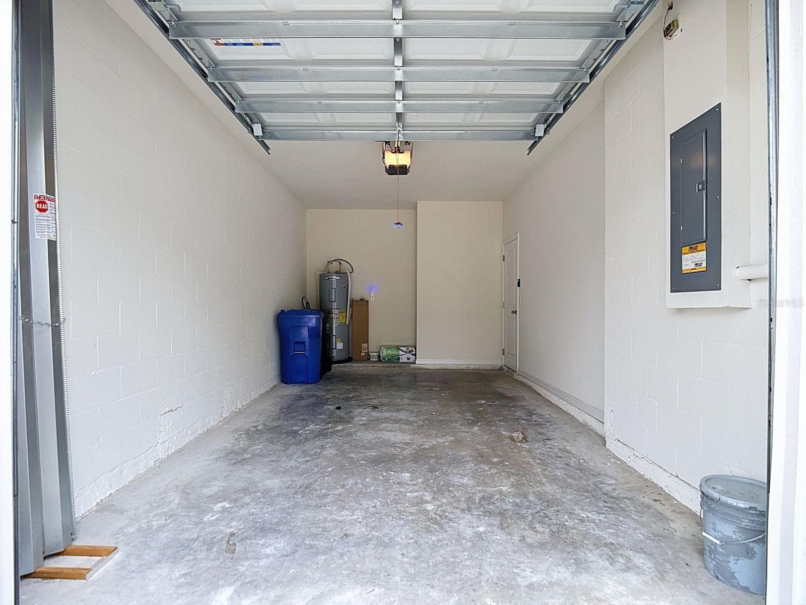 Hurricane panels are tucked inside the garage along with your trash and recycling cans - 3328 PLEASANT WILLOW CT, BRANDON