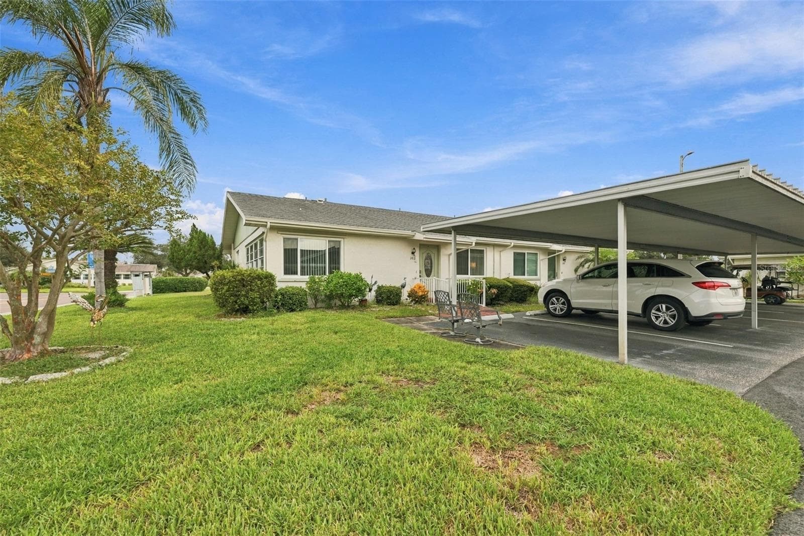 Car Port with 2 spaces - 202 GLOUCESTER BLVD #357, SUN CITY CENTER