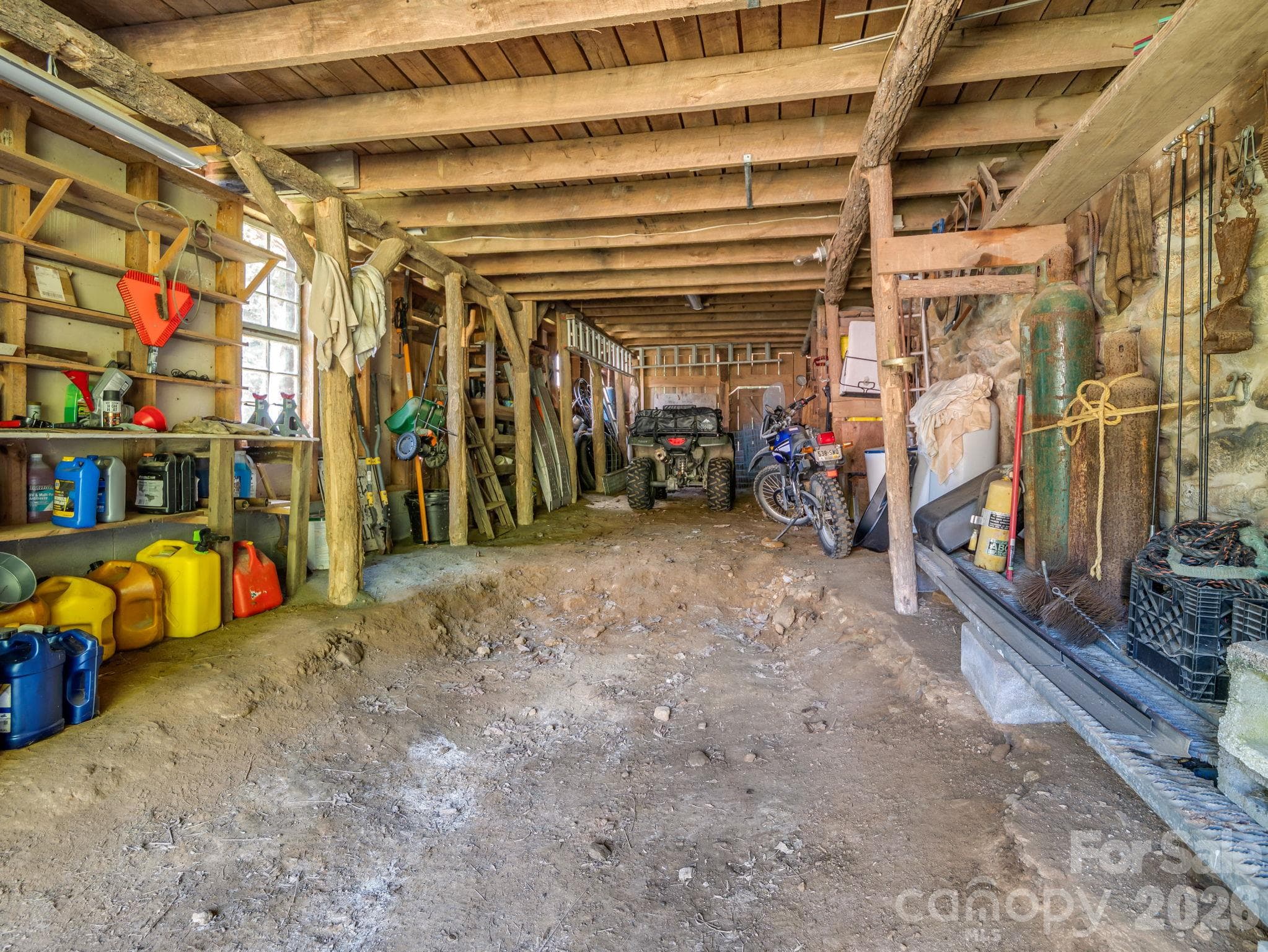 Barn #1 - Downstairs drive in tractor storage - 765 Hawk Ridge Lane, Marshall