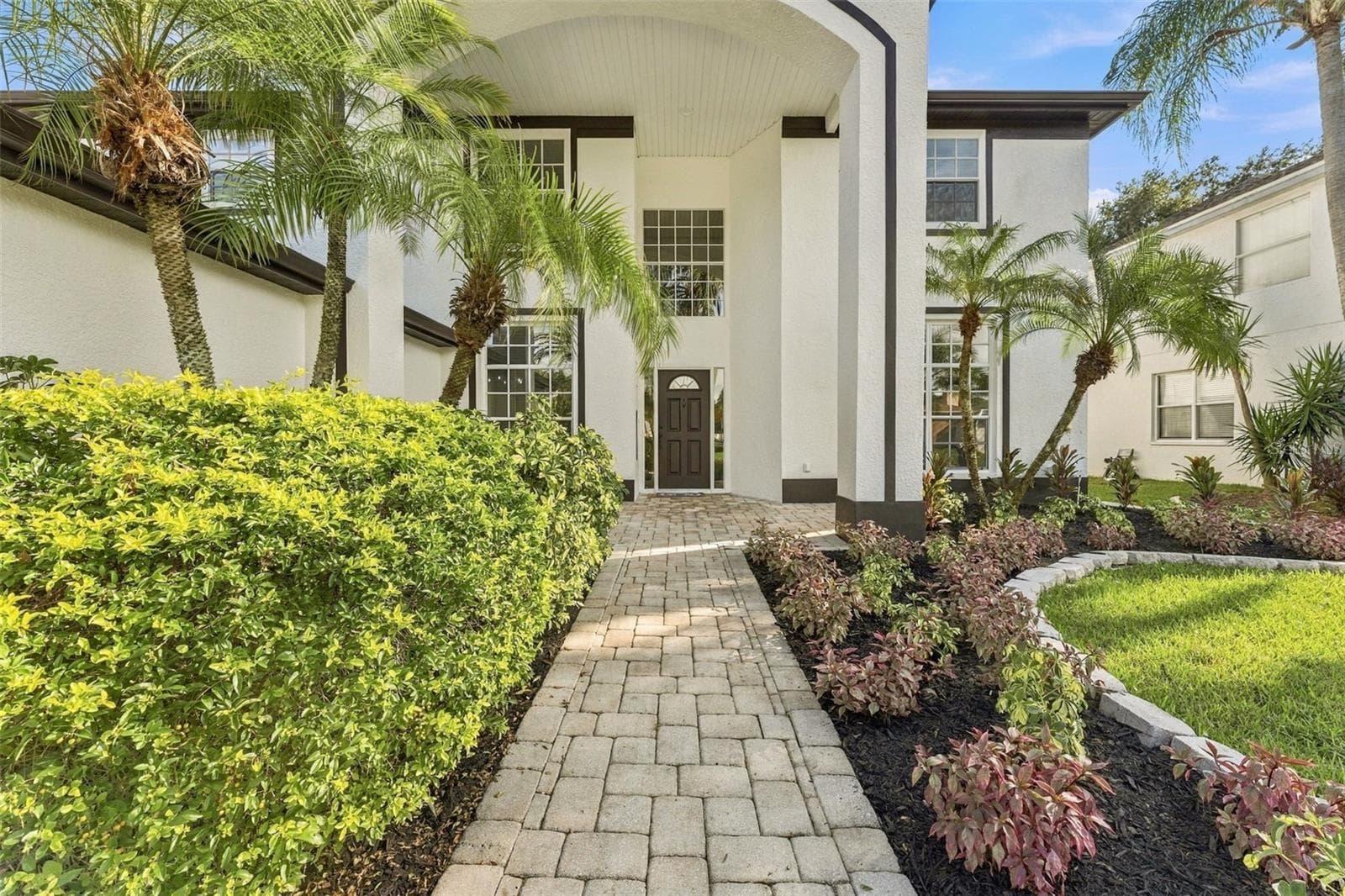 Pavered walkway leading to the front door - 10102 VISTA POINTE DR, TAMPA