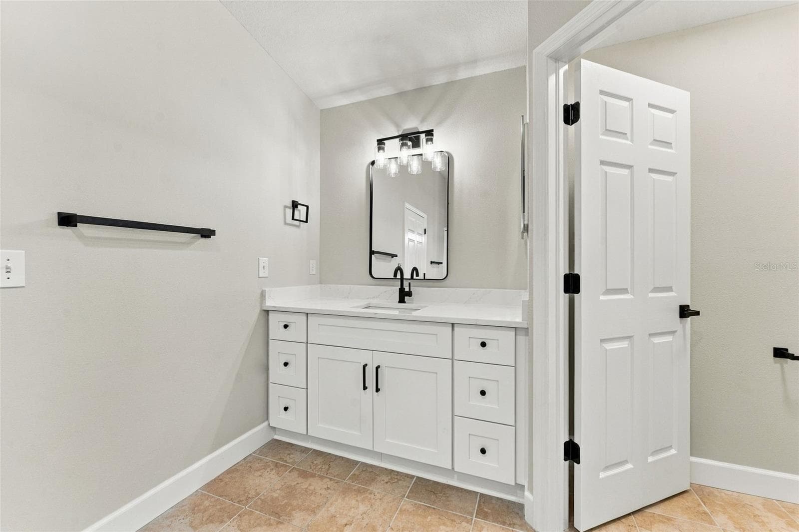 All new fixtures, finishes & vanities in this primary bathroom - 10102 VISTA POINTE DR, TAMPA