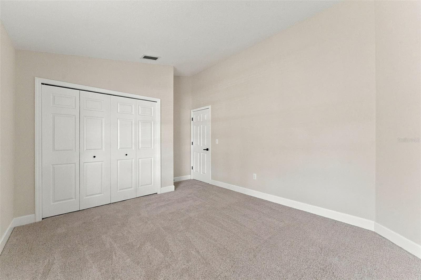 Bedroom 4 features a large wall closet - 10102 VISTA POINTE DR, TAMPA