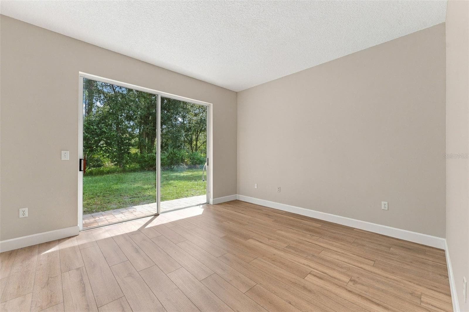 Office/bedroom located on the first floor gives you a flexible space that can be used however you need it - 10102 VISTA POINTE DR, TAMPA