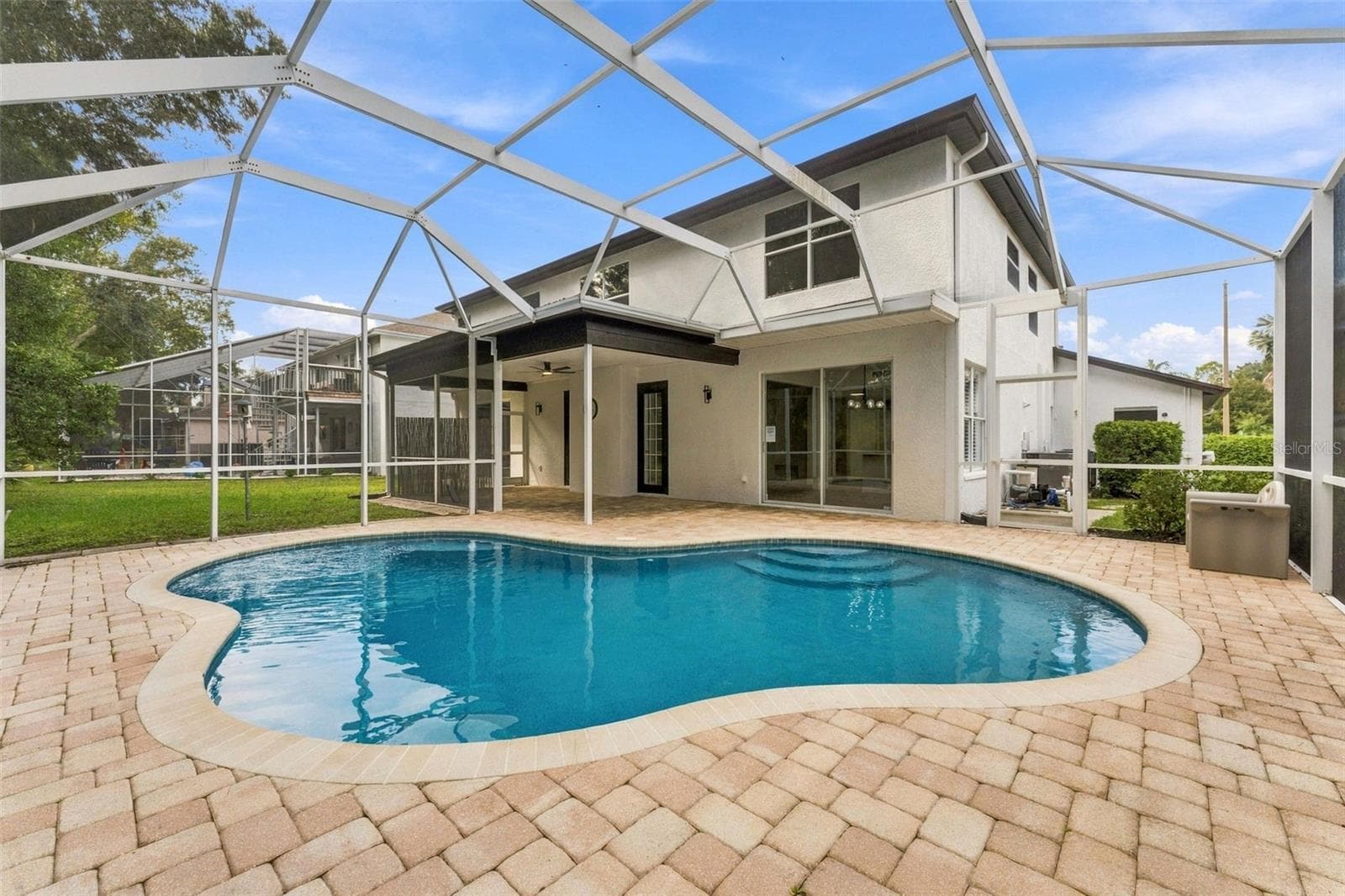 Beautiful pool area with paver deck - 10102 VISTA POINTE DR, TAMPA